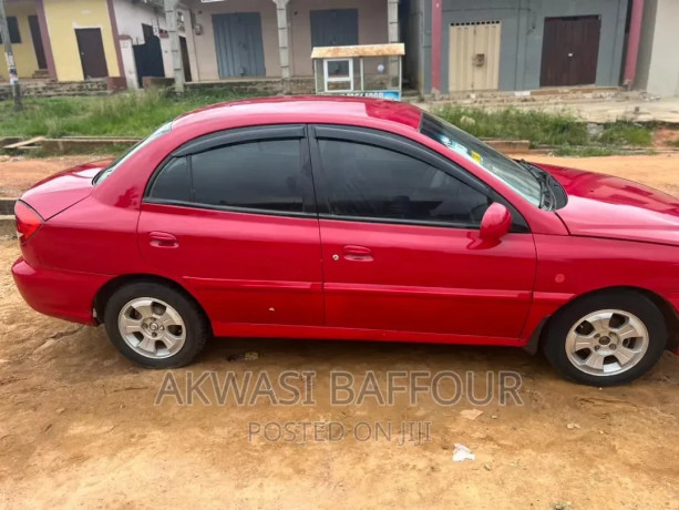 kia-rio-2010-red-big-1