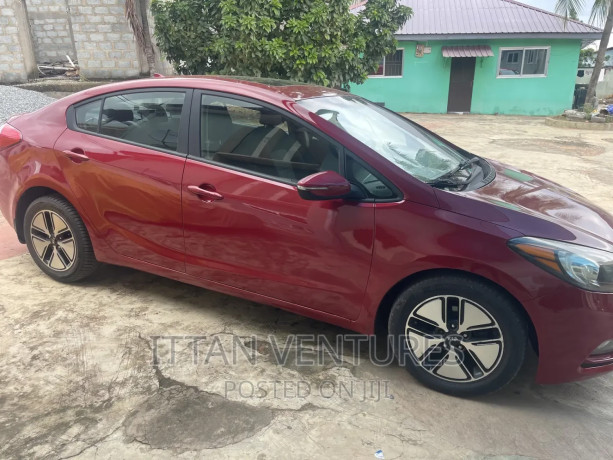 kia-forte-lx-sedan-2014-red-big-2