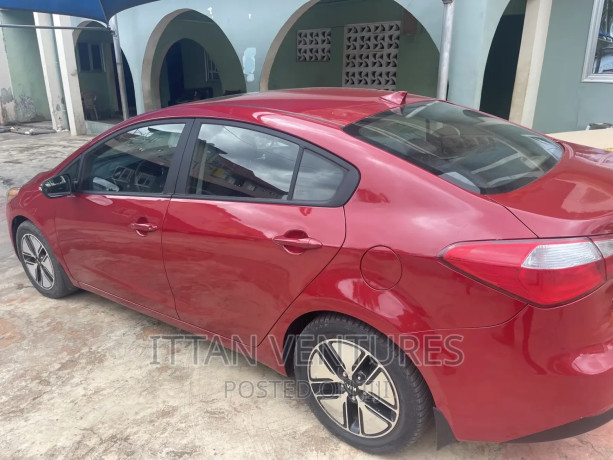 kia-forte-lx-sedan-2014-red-big-1