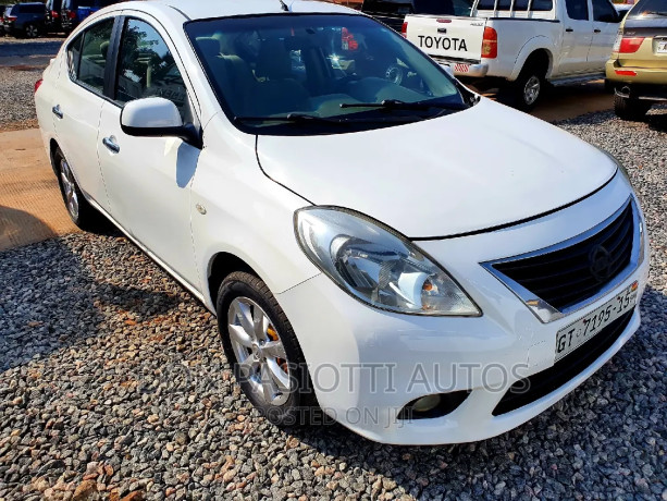 nissan-almera-2014-white-big-2