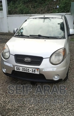 kia-morning-2010-silver-big-0