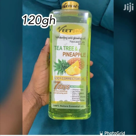 veet-gold-tea-tree-and-pineapple-body-glowing-oil-big-0