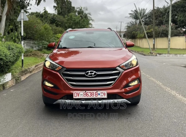 hyundai-tucson-se-awd-2016-orange-big-0