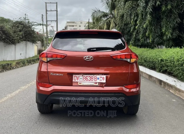 hyundai-tucson-se-awd-2016-orange-big-1