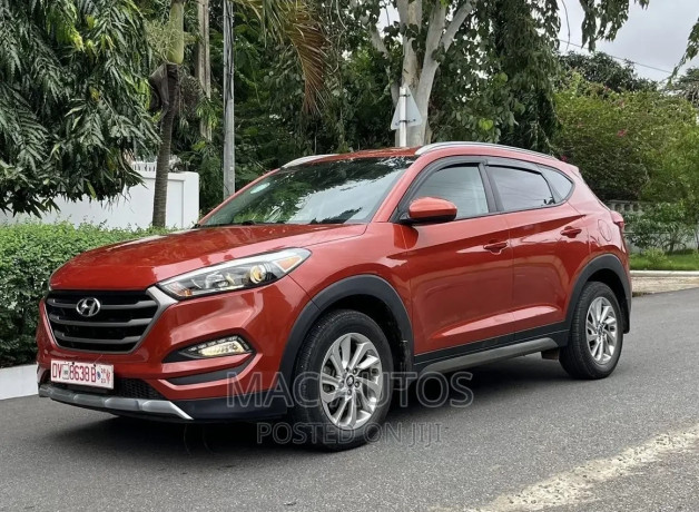 hyundai-tucson-se-awd-2016-orange-big-3