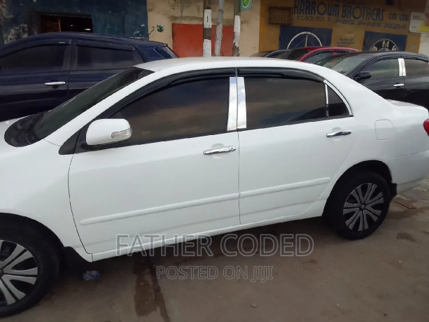 toyota-corolla-2006-white-big-1