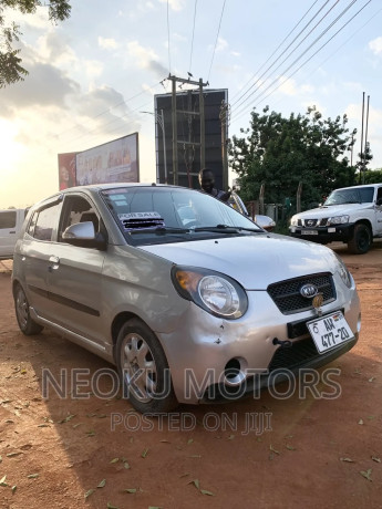 kia-morning-2011-silver-big-0