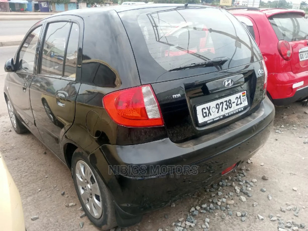 hyundai-getz-13-gls-2010-black-big-3