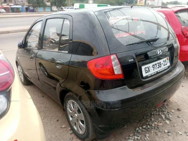 hyundai-getz-13-gls-2010-black-big-4