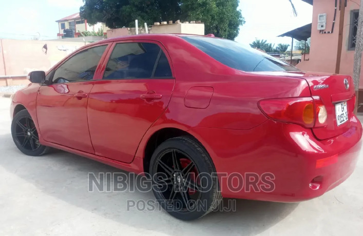 toyota-corolla-2010-red-big-3