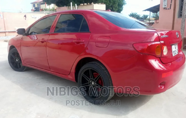 toyota-corolla-2010-red-big-2