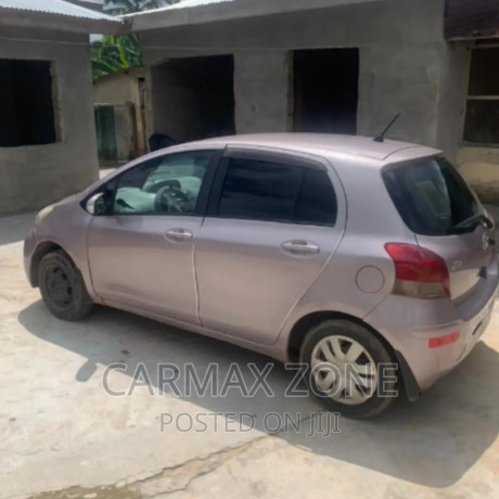 toyota-vitz-13-fwd-5dr-2010-brown-big-3