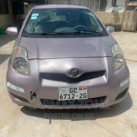 toyota-vitz-13-fwd-5dr-2010-brown-big-0