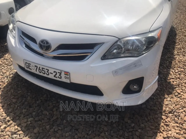 toyota-corolla-2010-white-big-1