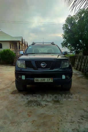 nissan-navara-25-dci-automatic-2009-black-big-1