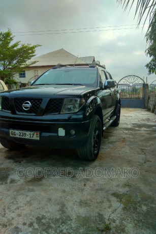 nissan-navara-25-dci-automatic-2009-black-big-0