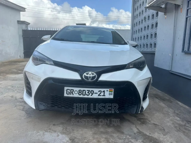 toyota-corolla-2015-white-big-0