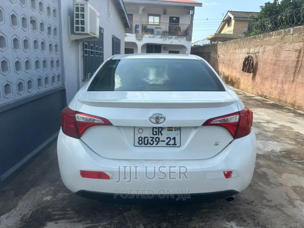 toyota-corolla-2015-white-big-1