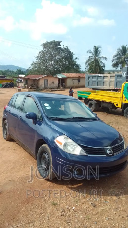 nissan-versa-18-sl-hatchback-2010-blue-big-4