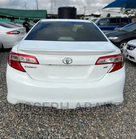 toyota-camry-2014-white-big-1