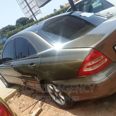 mercedes-benz-e230-2010-brown-big-4