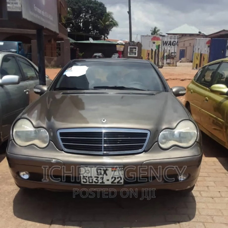 mercedes-benz-e230-2010-brown-big-0