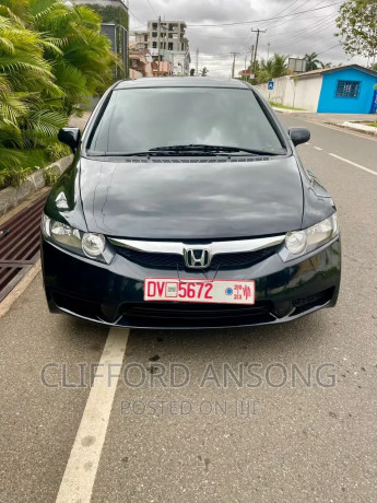 honda-civic-dx-sedan-2010-black-big-1