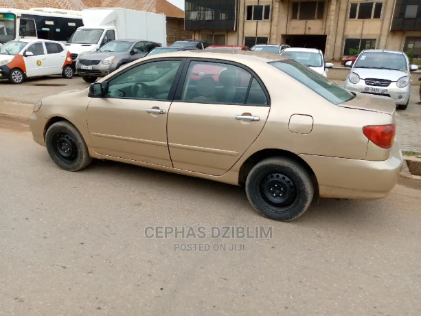 toyota-corolla-le-2007-gold-big-3