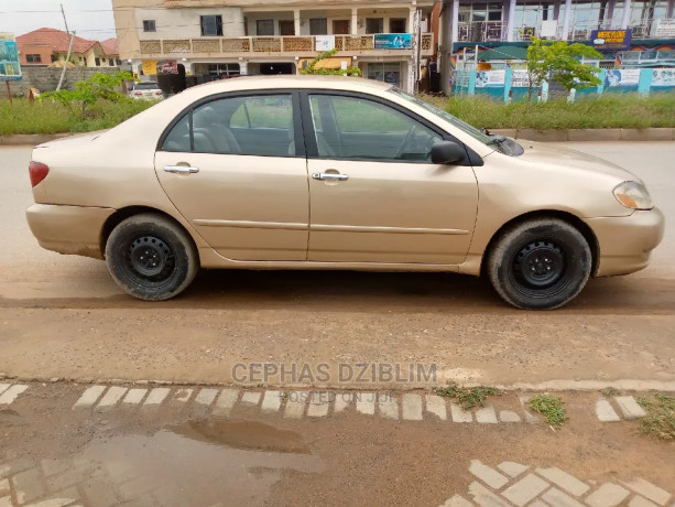 toyota-corolla-le-2007-gold-big-2