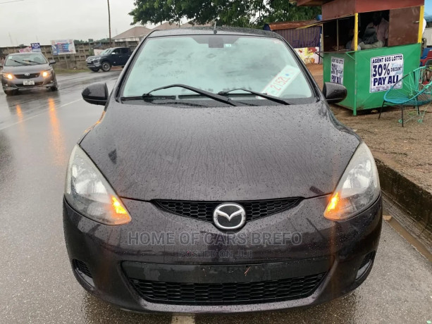 mazda-demio-2012-brown-big-0