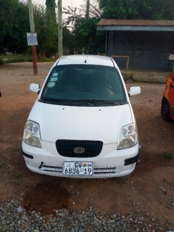 kia-picanto-2010-white-big-0