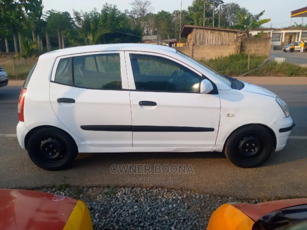 kia-picanto-2010-white-big-2