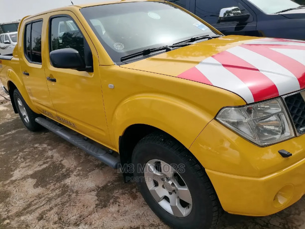 nissan-navara-2005-yellow-big-2