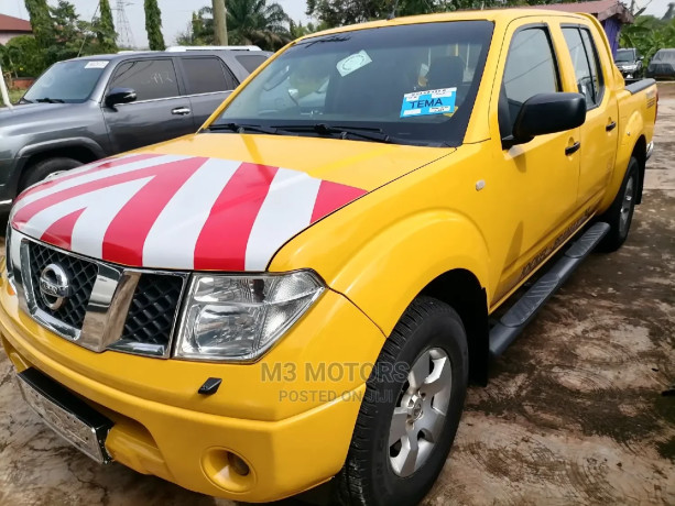 nissan-navara-2005-yellow-big-1