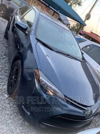 toyota-corolla-le-18l-4cyl-2a-2018-gray-big-0