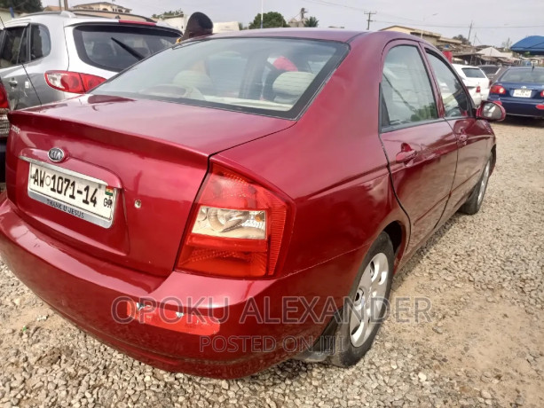 kia-spectra-2009-red-big-0