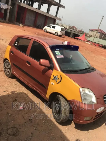 kia-picanto-11-2010-gold-big-1